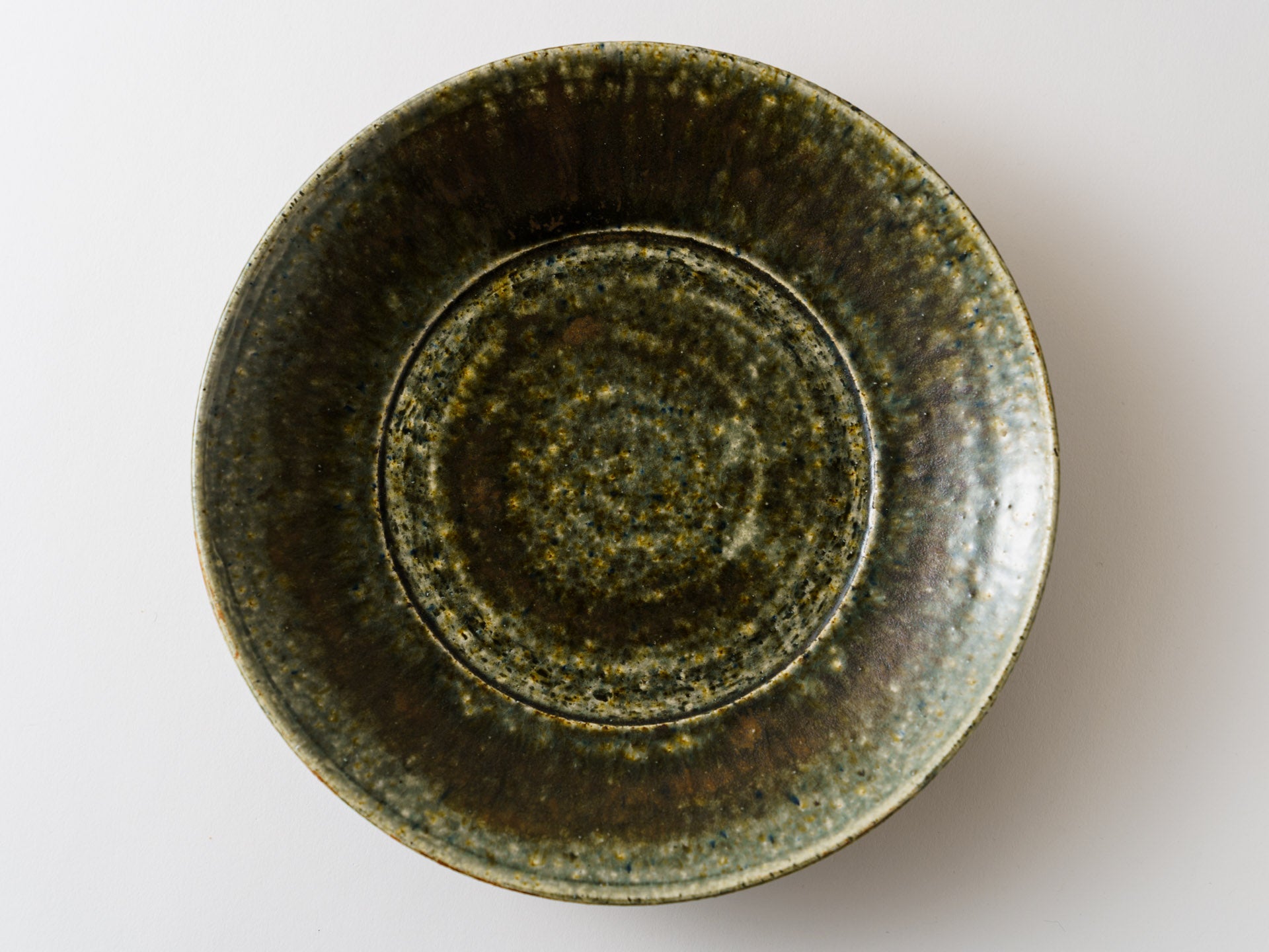 Rust green glaze 7.5 inch plate [Kanae Nomura]