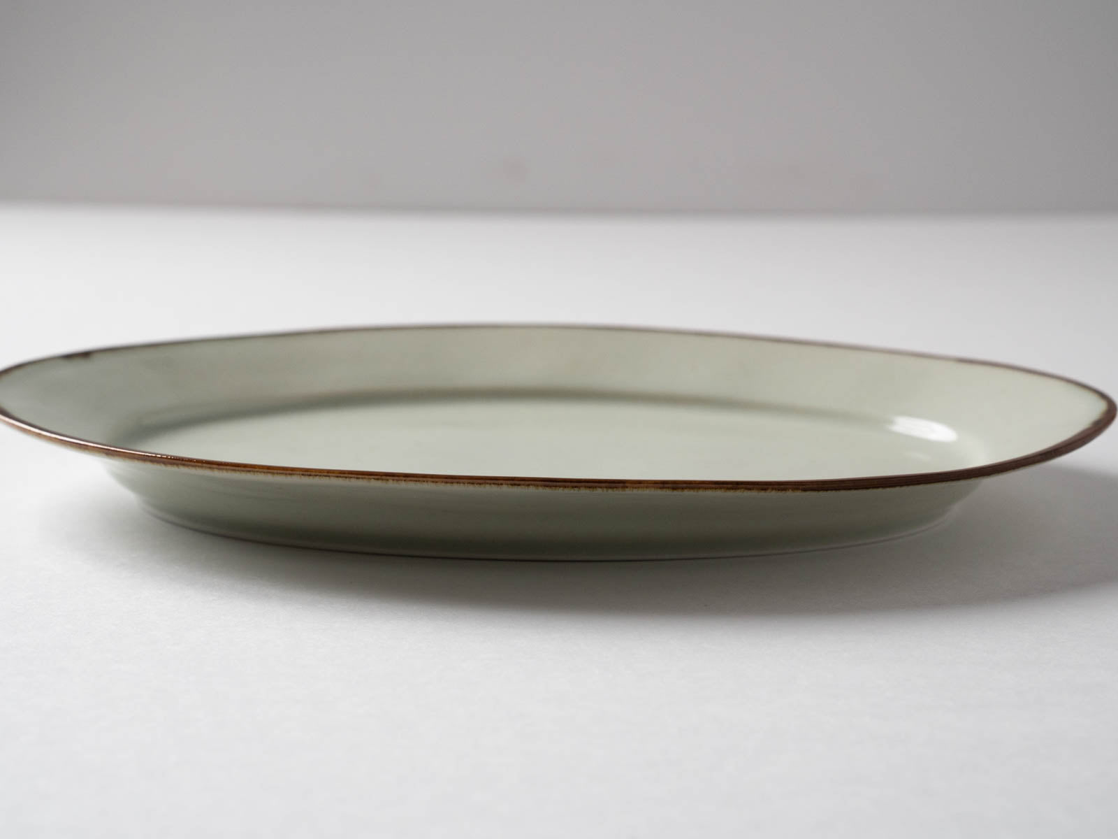 Large rim oval plate Fuchisabi Richo [Koyogama]