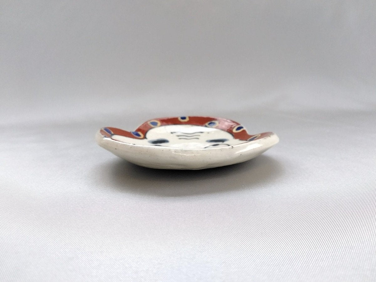 Hyottoko face-shaped small plate [Porcelain Studio Raku]