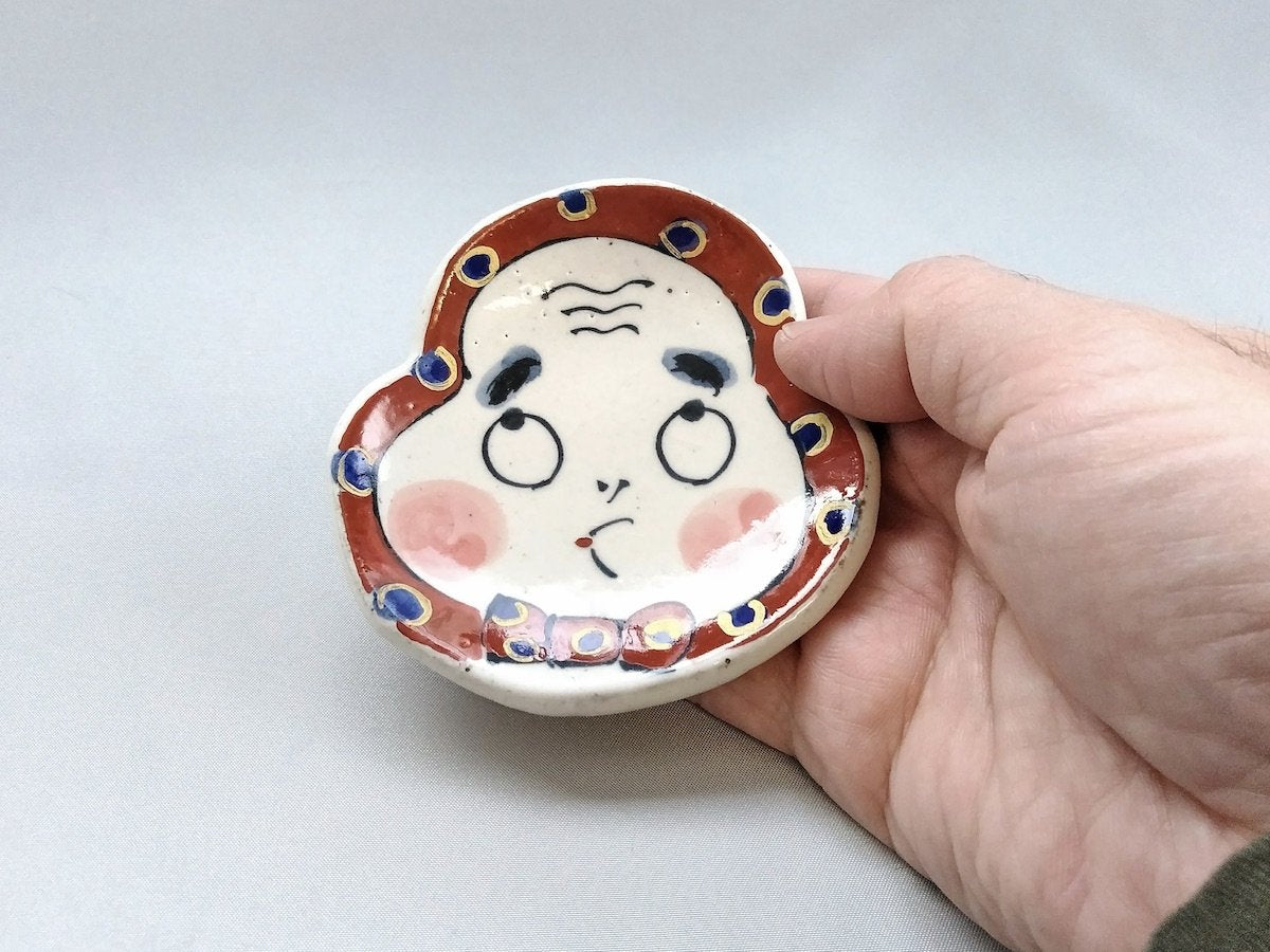 Hyottoko face-shaped small plate [Porcelain Studio Raku]